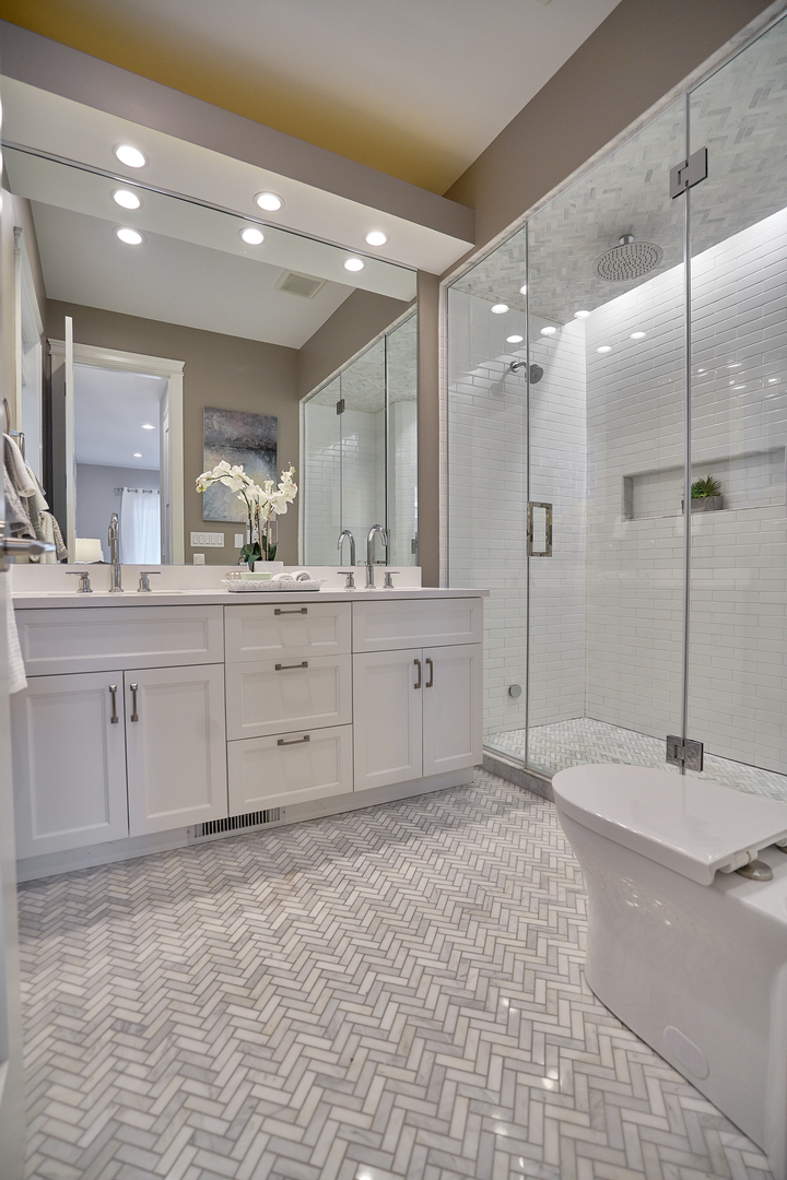 3044 North Racine Avenue, Unit 2 Chicago, IL 60657 - Photo 21 of 27 a bathroom with a sink a toilet and a mirror