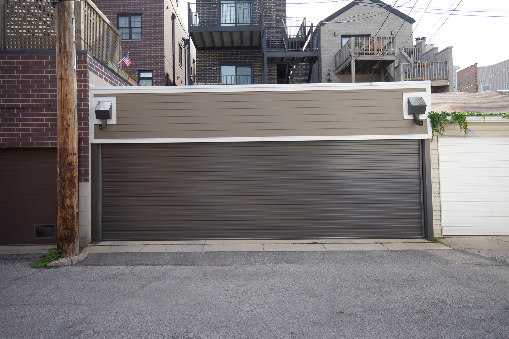 3044 North Racine Avenue, Unit 2 Chicago, IL 60657 - Photo 27 of 27 a view of a house with a parking space