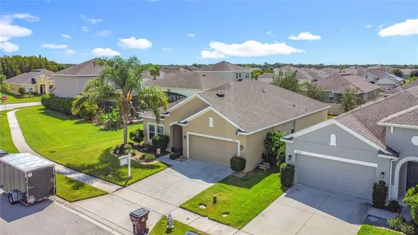 a house view with a seating space and garden view