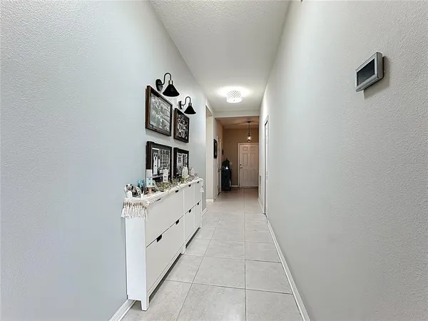 a kitchen with a sink stainless steel appliances and cabinets