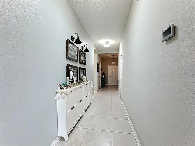 a kitchen with a sink stainless steel appliances and cabinets