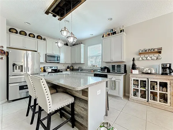 a room with furniture and wooden floor