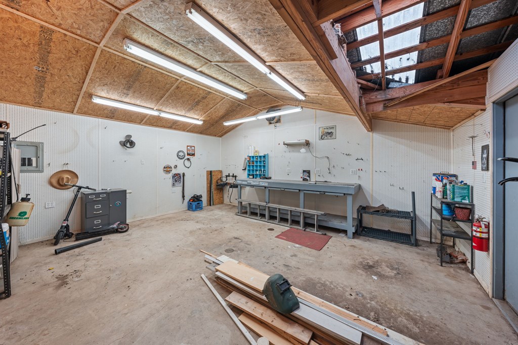 1209 Park Street Kerrville, TX 78028 - Photo 25 of 28 a room with storage and a white roof