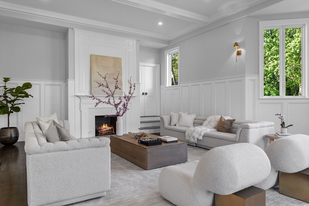 3 Myopia Road Winchester, MA 01890 - Photo 23 of 42 a living room with furniture and a fireplace