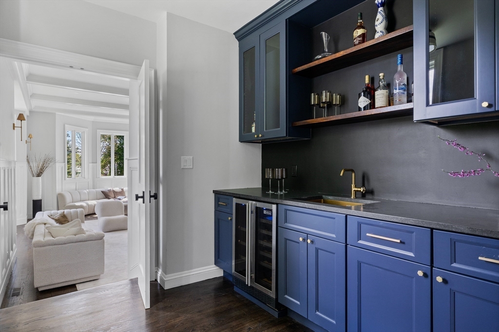 3 Myopia Road Winchester, MA 01890 - Photo 25 of 42 a kitchen with stainless steel appliances granite countertop a stove and cabinets