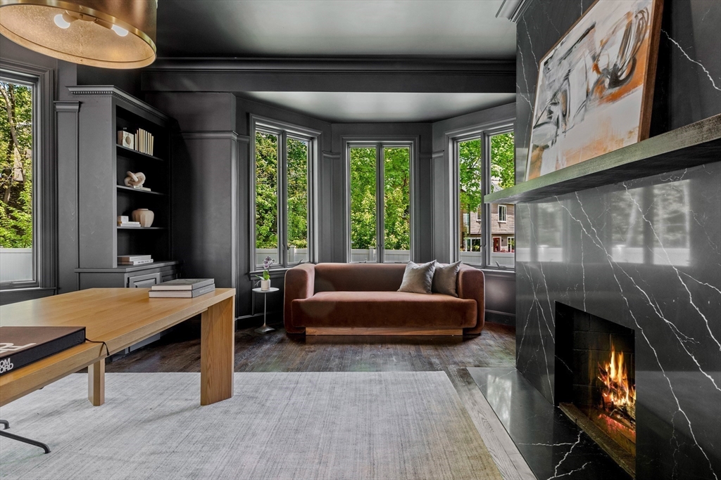 3 Myopia Road Winchester, MA 01890 - Photo 26 of 42 a living room with furniture and a fireplace