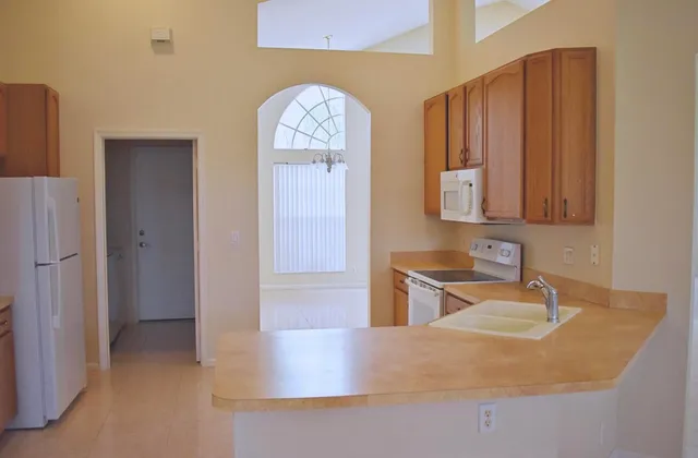 a view of a kitchen with a sink