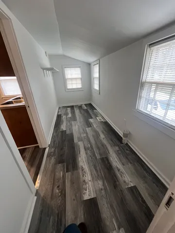 a view of an empty room and window
