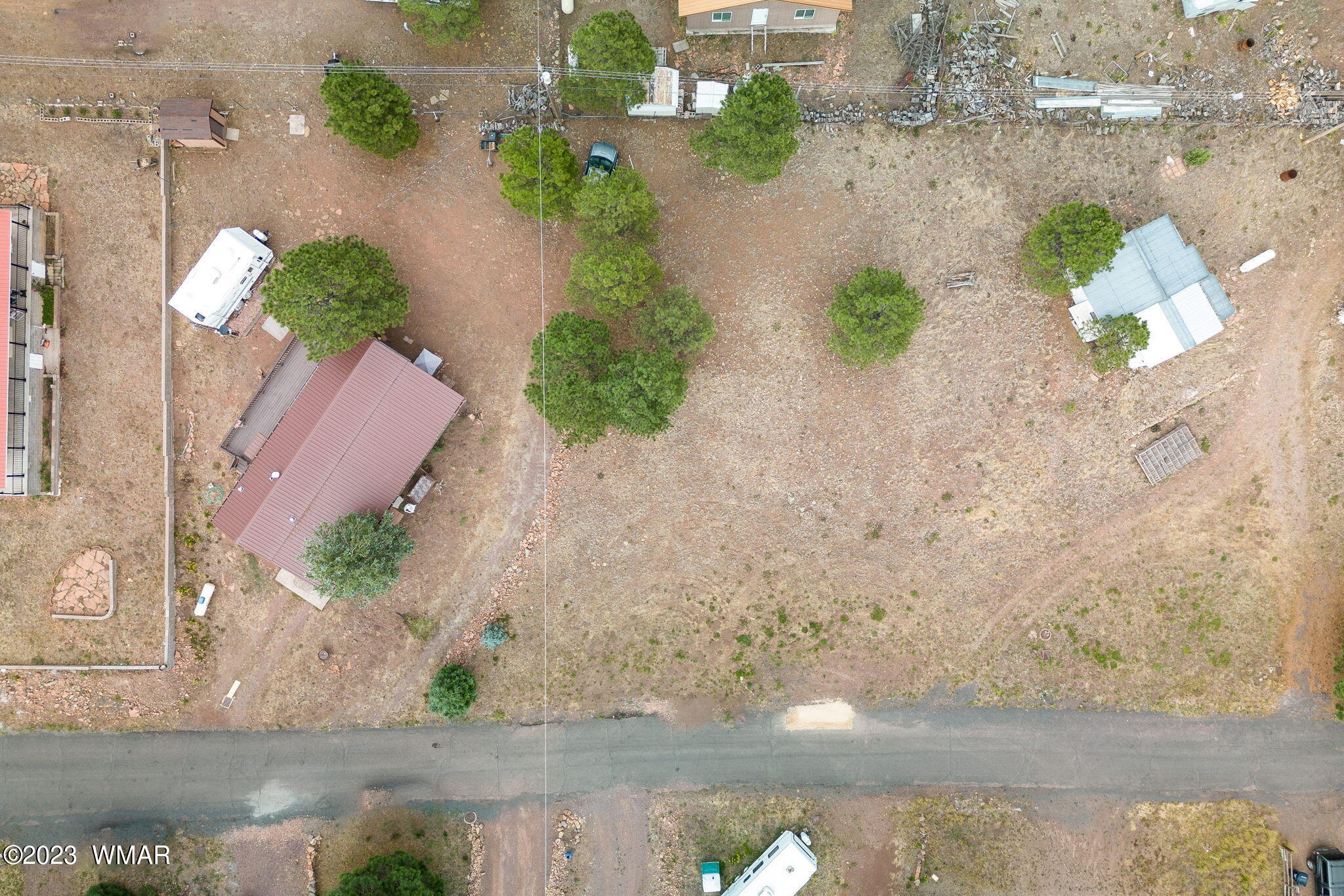 20 County Road 2140 Alpine, AZ 85920 - Photo 31 of 32 an aerial view of a house with a yard and a lake view