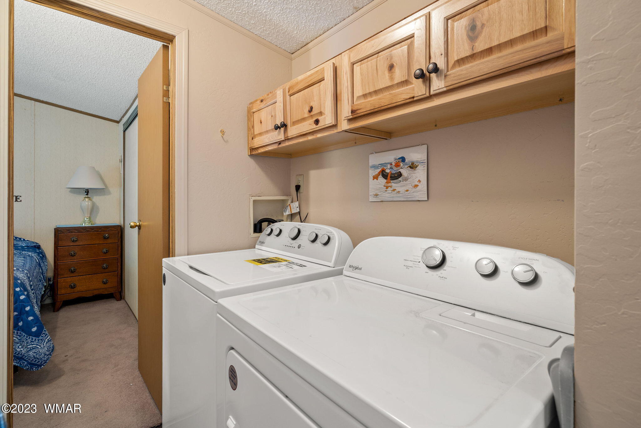 20 County Road 2140 Alpine, AZ 85920 - Photo 8 of 32 a utility room with dryer and washer