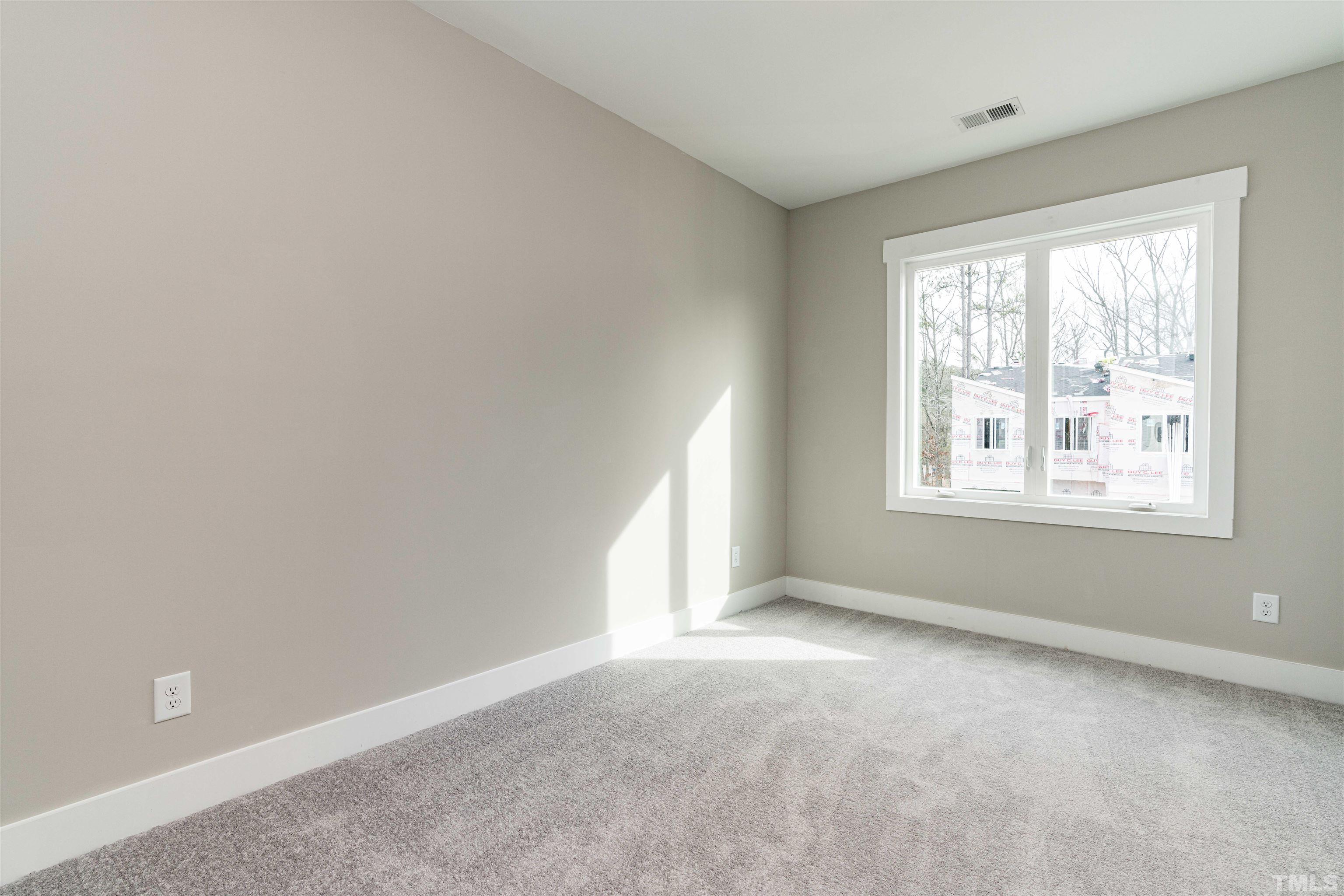 3916 Convergence Street Durham, NC 27704 - Photo 30 of 34 an empty room with windows