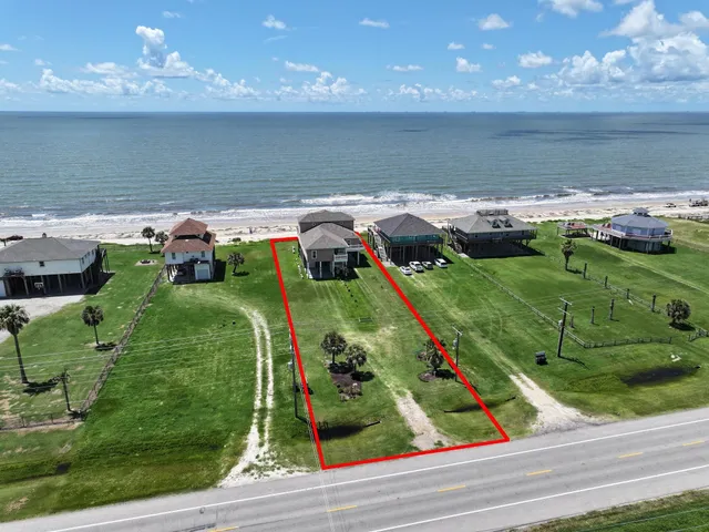 a view of swimming pool with a yard and plants