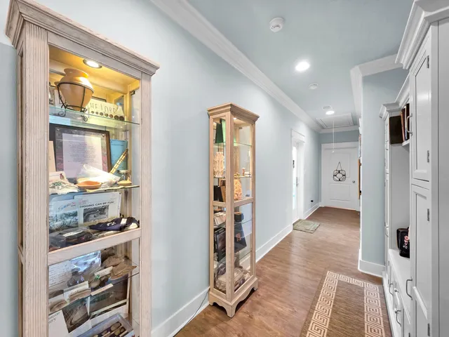 a spacious bathroom with a double vanity sink mirror and shower