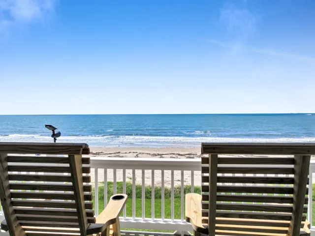 a view of a room with furniture and stairs