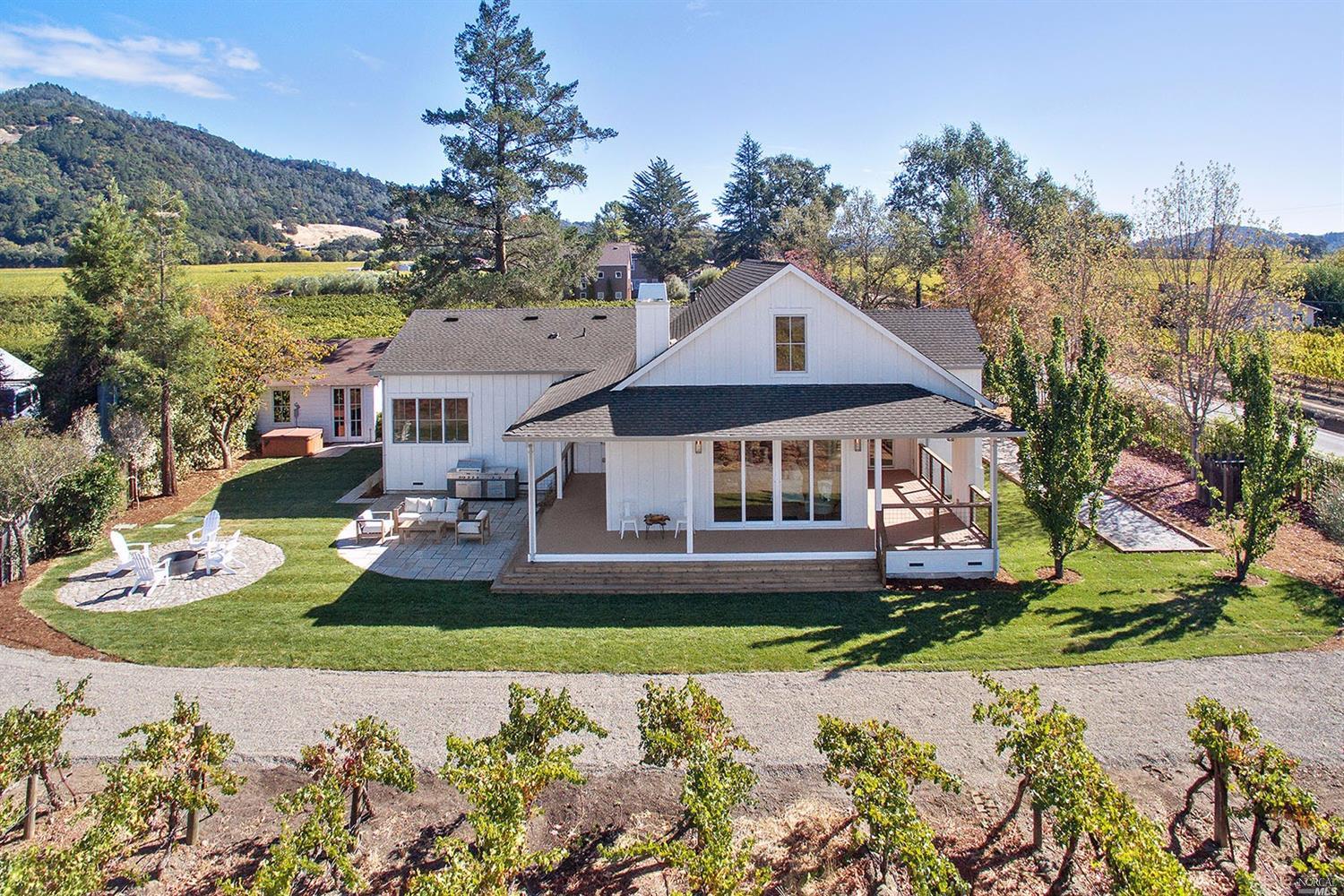 6476 Red Winery Road Geyserville, CA 95441 - Photo 1 of 1 a front view of a house with a garden