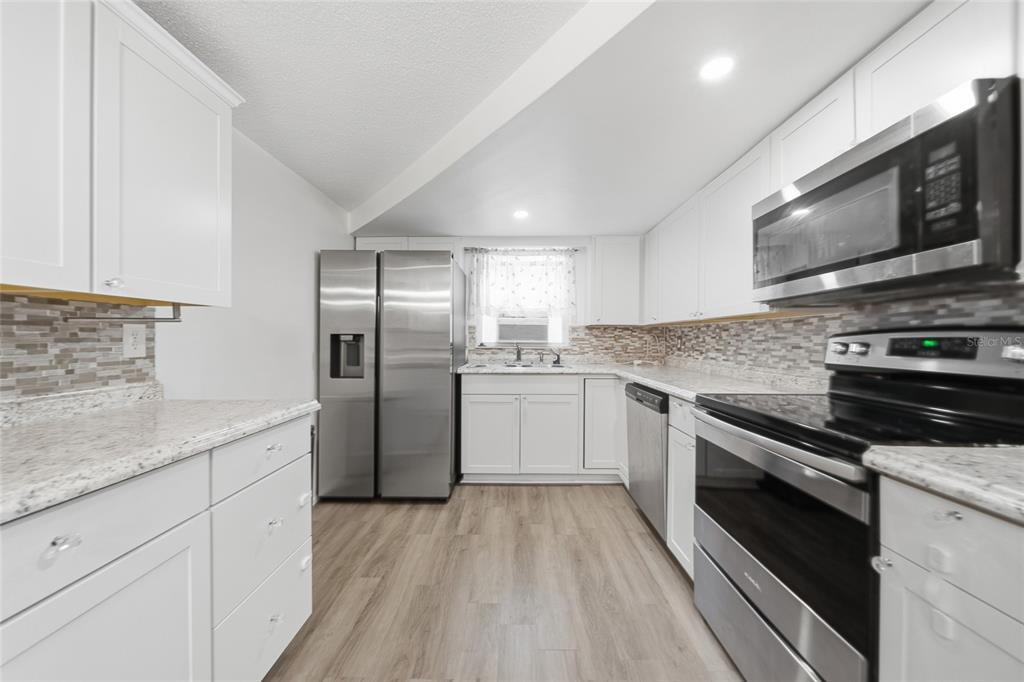 9316 Mark Twain Lane Port Richey, FL 34668 - Photo 4 of 17