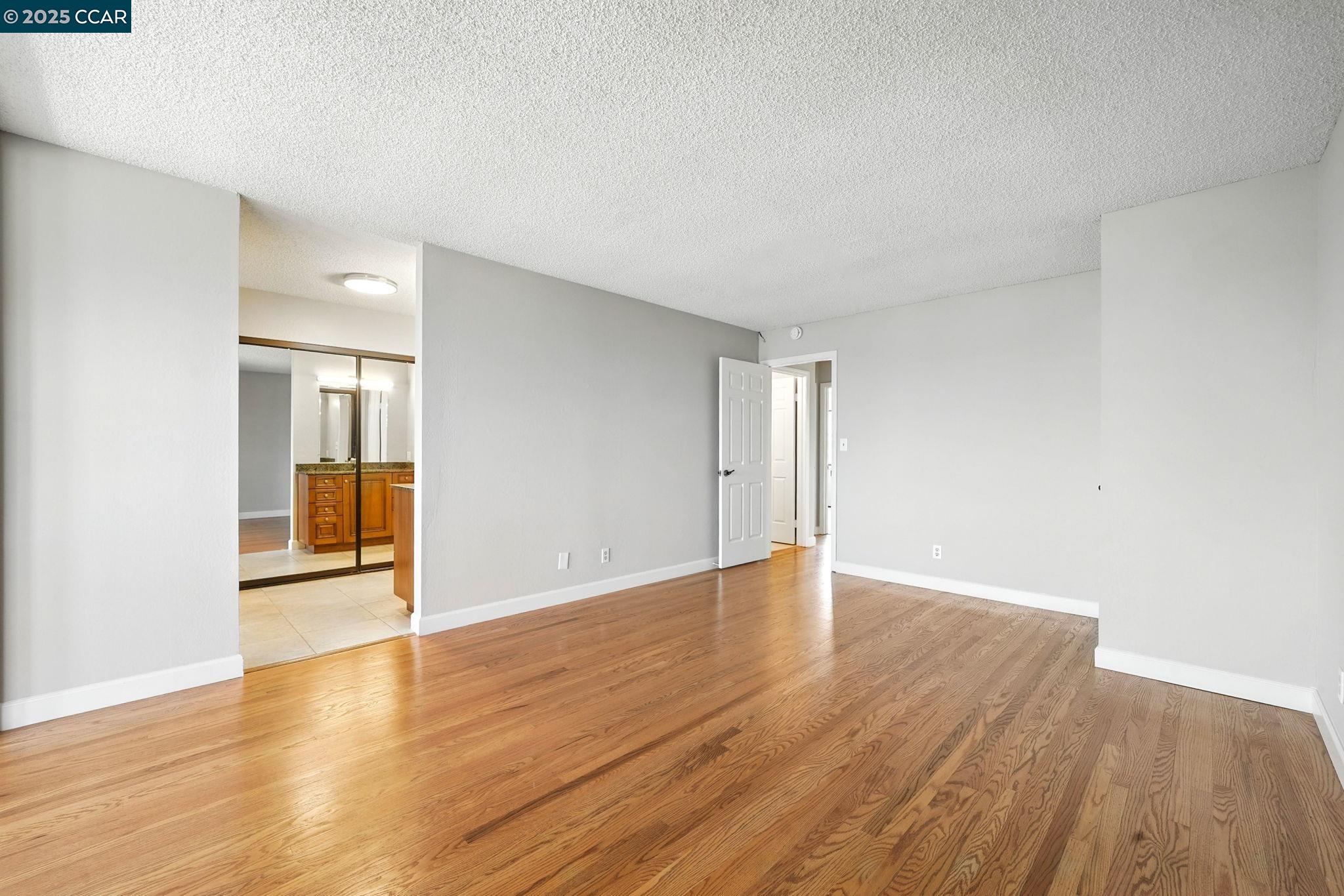 267 Duperu Drive Crockett, CA 94525 - Photo 33 of 50 a view of an empty room with wooden floor