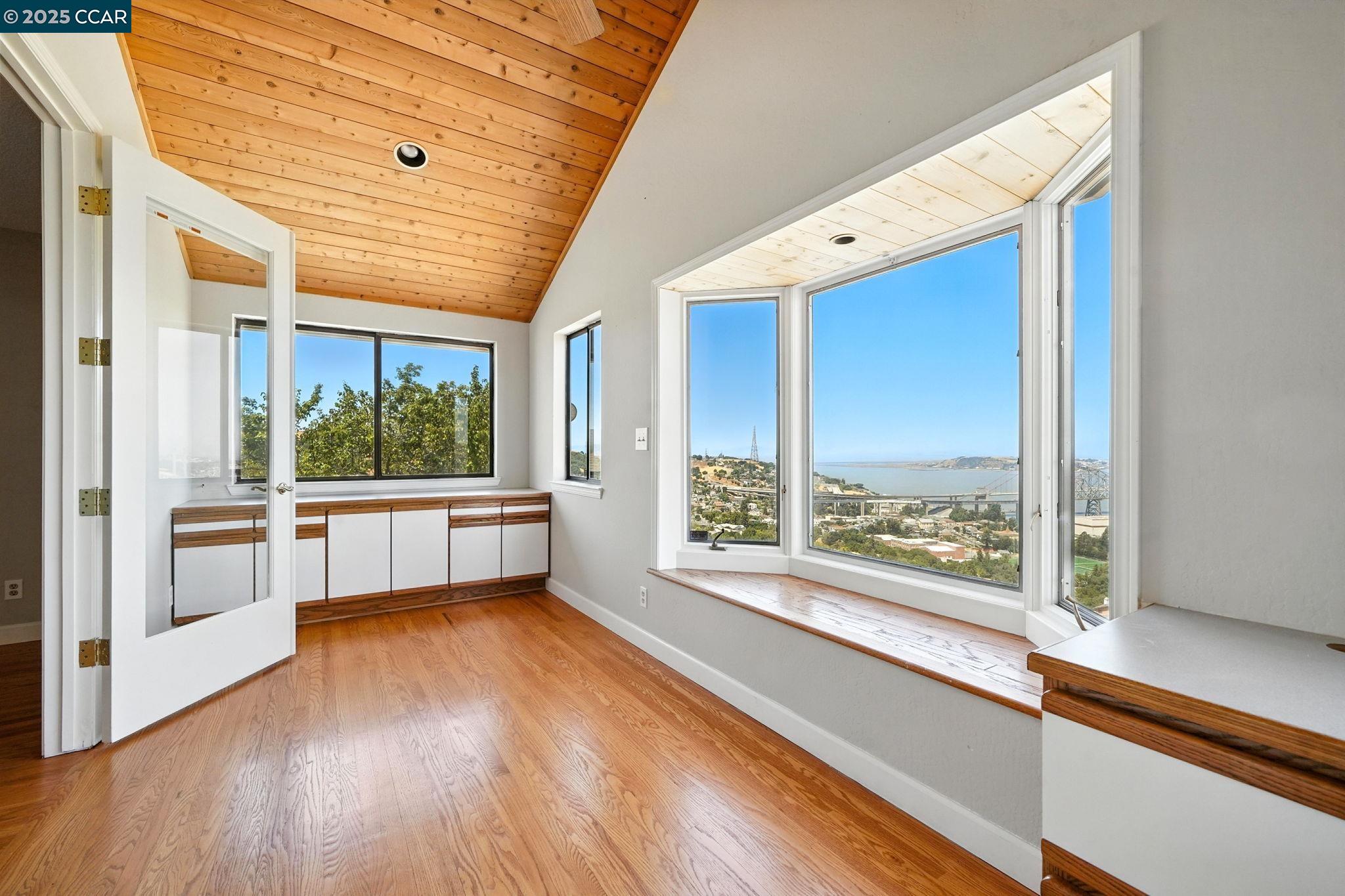 267 Duperu Drive Crockett, CA 94525 - Photo 38 of 50 a view of an empty room with wooden floor and a window