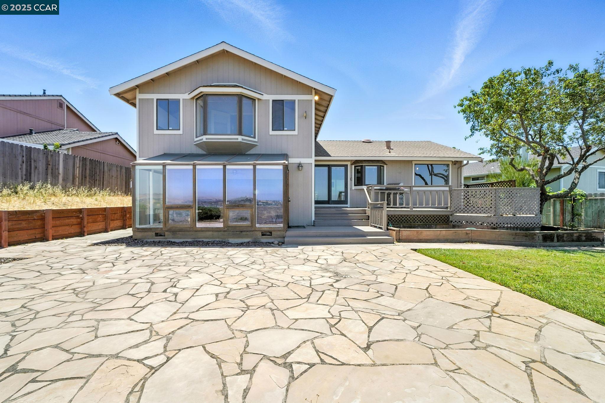267 Duperu Drive Crockett, CA 94525 - Photo 43 of 50 a front view of a house with a yard and garage