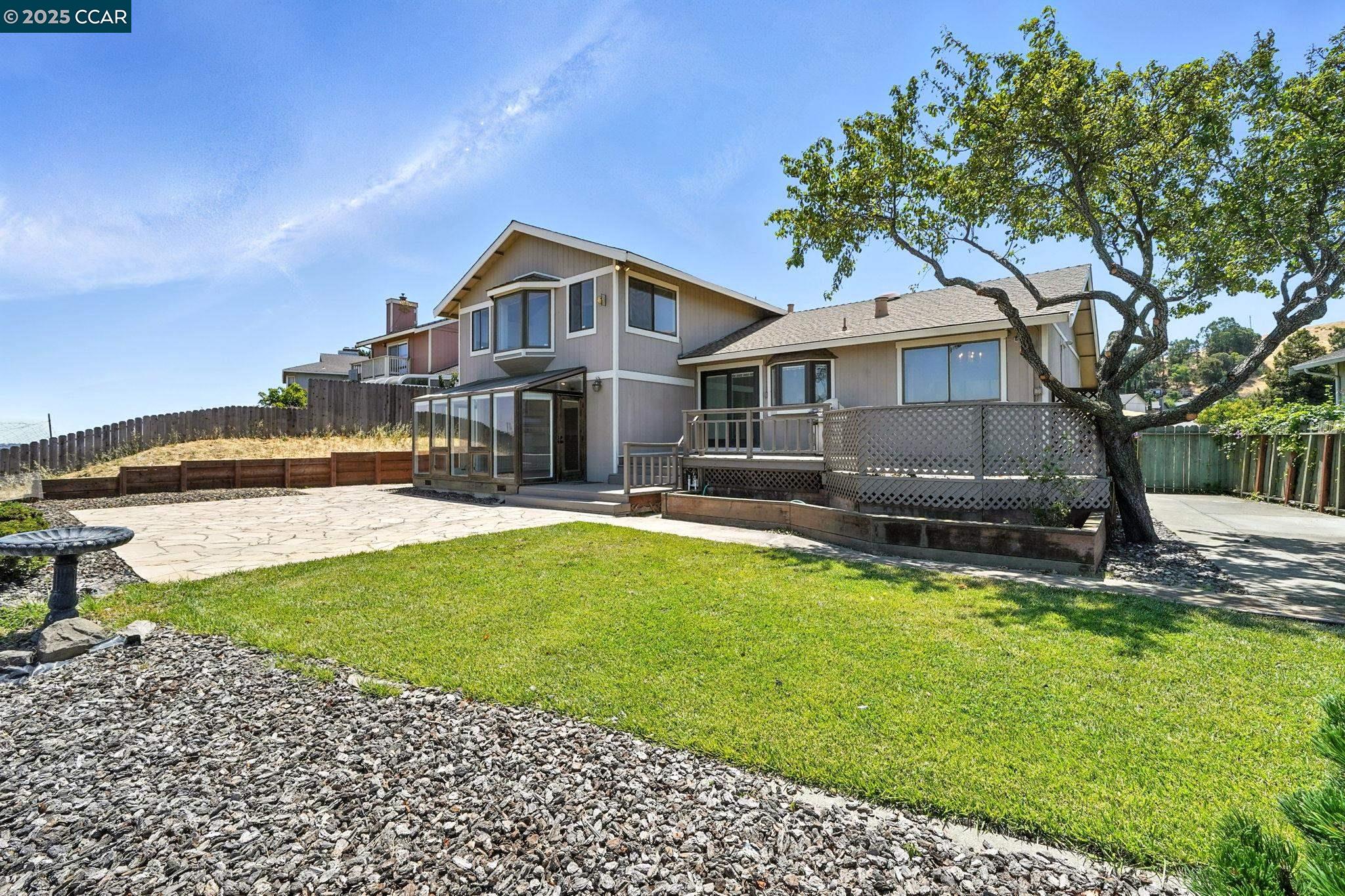 267 Duperu Drive Crockett, CA 94525 - Photo 45 of 50 a front view of a house with a yard table and chairs