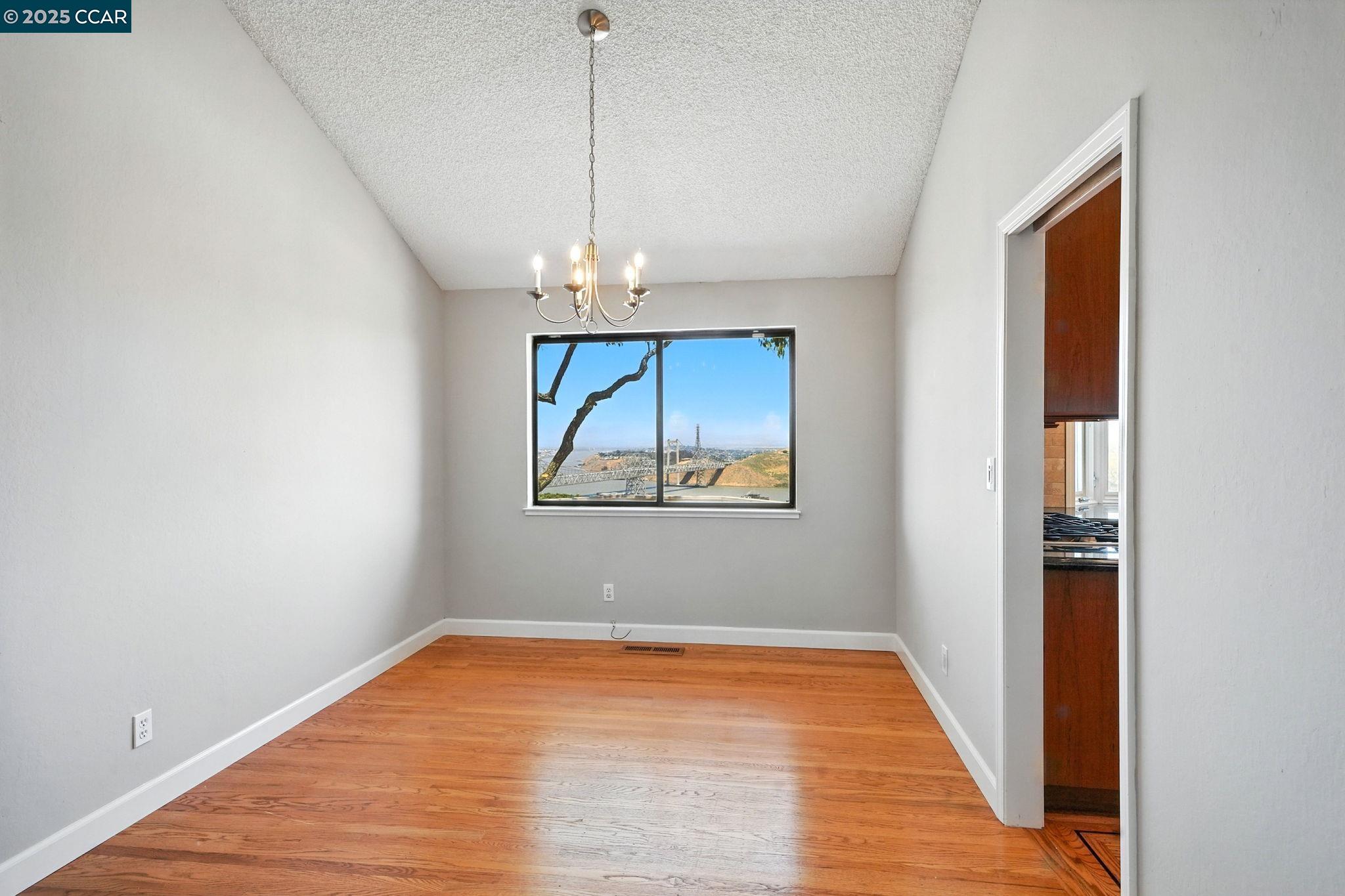 267 Duperu Drive Crockett, CA 94525 - Photo 7 of 50 a view of empty room with wooden floor