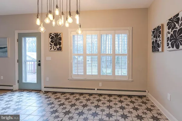 a view of entryway with a front door