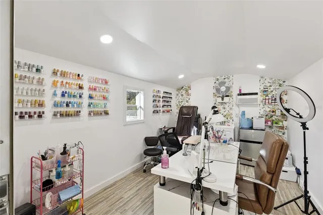 a view of a workspace with furniture and workspace