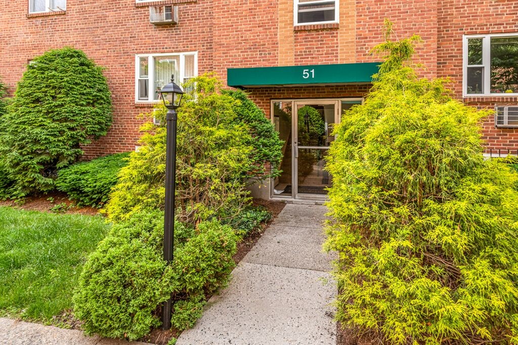 51 Colborne Road, Unit 3 Boston, MA 02135 - Photo 11 of 12 a front view of a house with garden