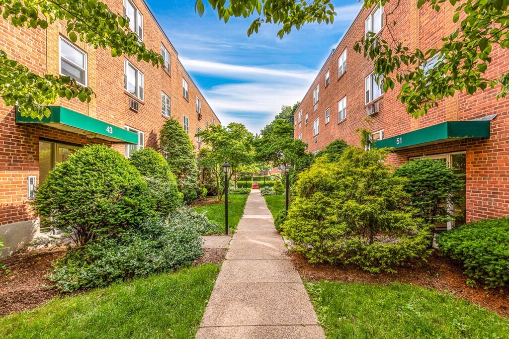 51 Colborne Road, Unit 3 Boston, MA 02135 - Photo 12 of 12 a view of a pathway with house on both side