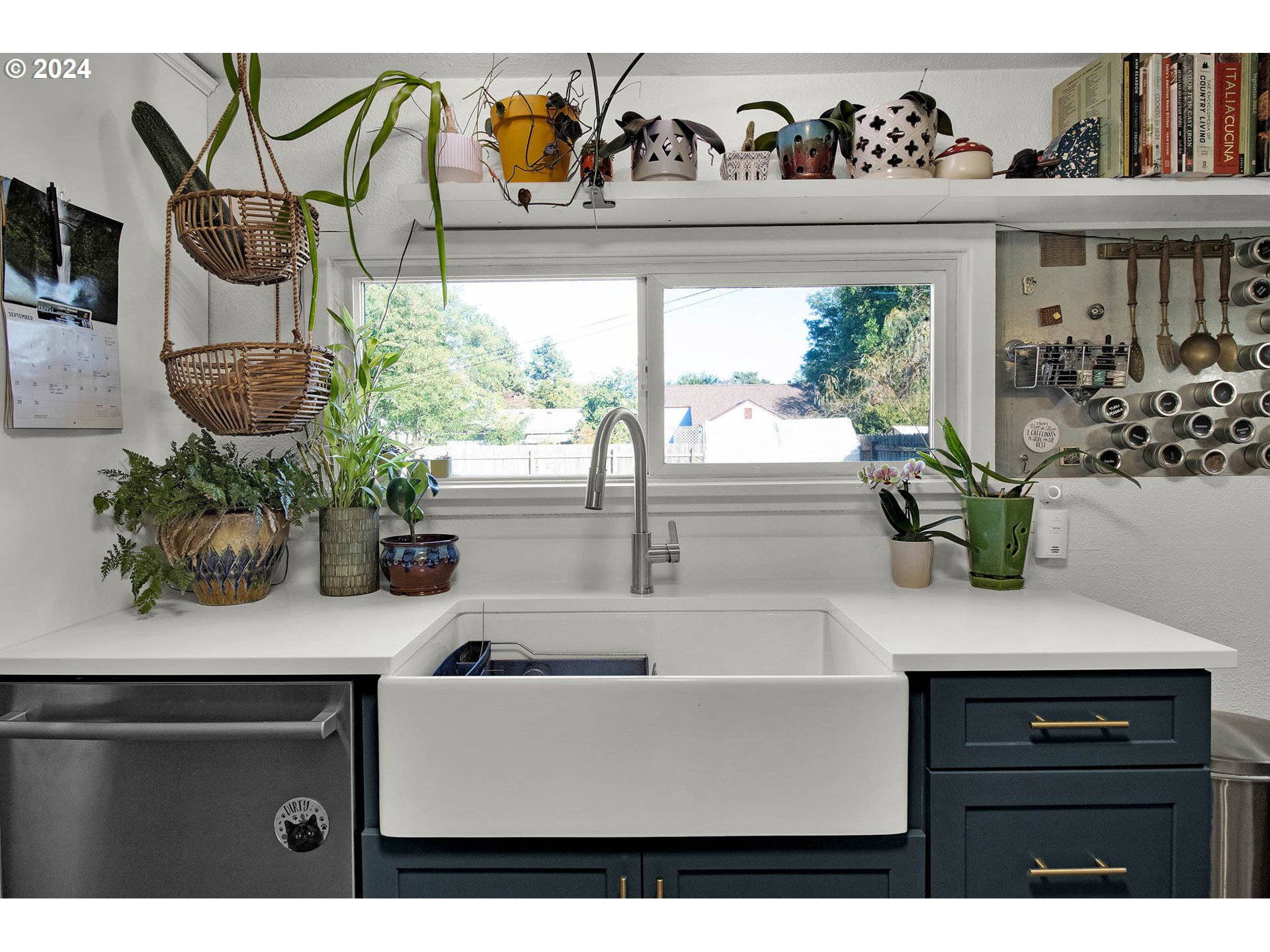 3455 Concord Street Eugene, OR 97402 - Photo 26 of 47 a kitchen with a sink and a potted plant
