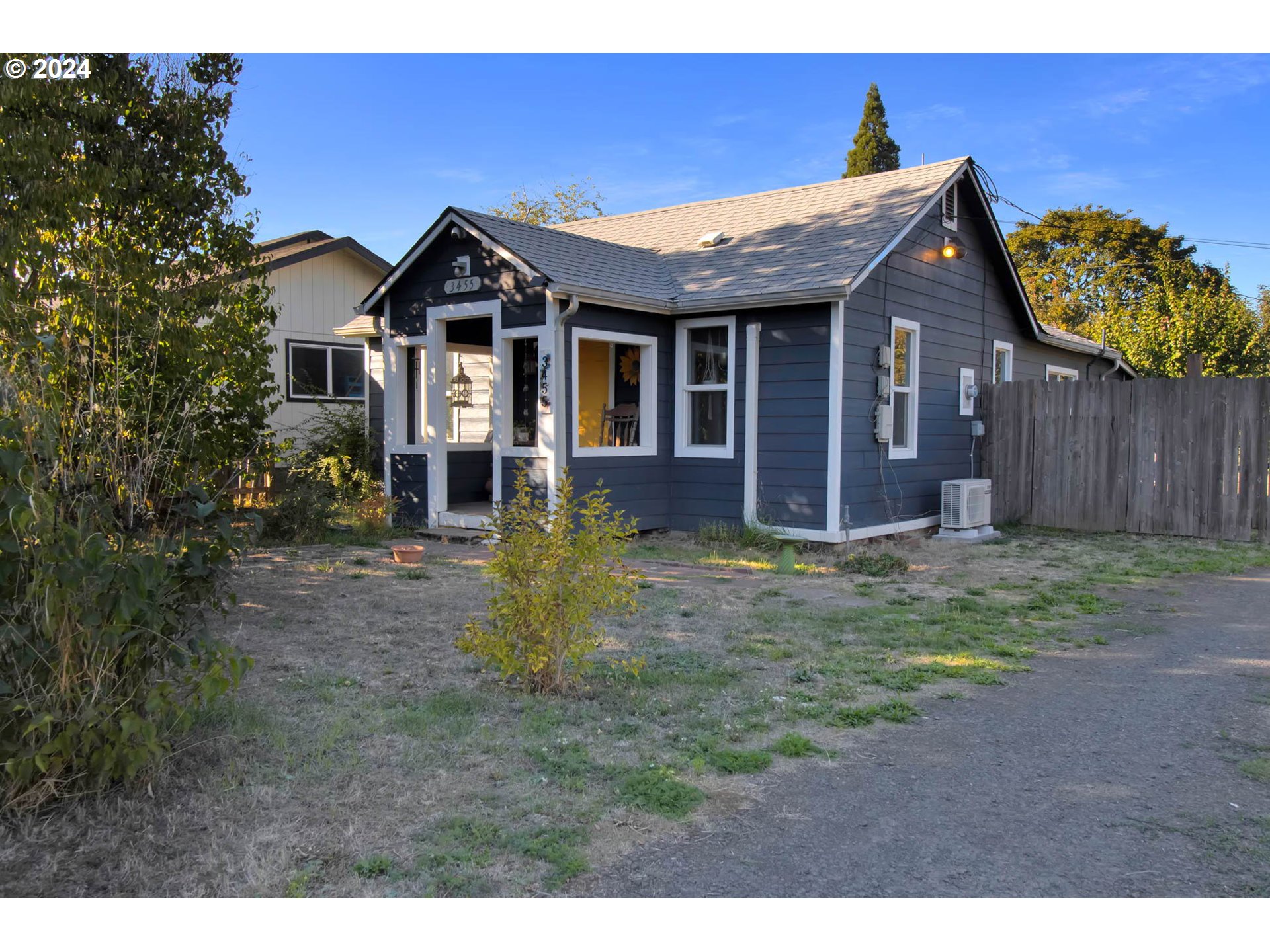 3455 Concord Street Eugene, OR 97402 - Photo 3 of 47 a front view of a house with a yard