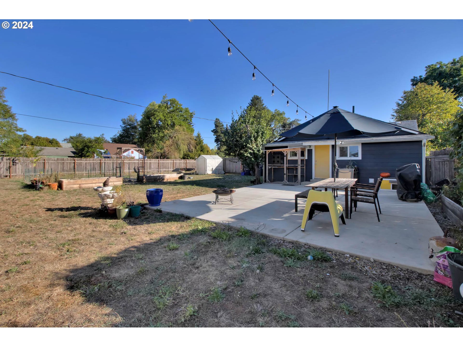 3455 Concord Street Eugene, OR 97402 - Photo 36 of 47 a view of a house with backyard porch and sitting area