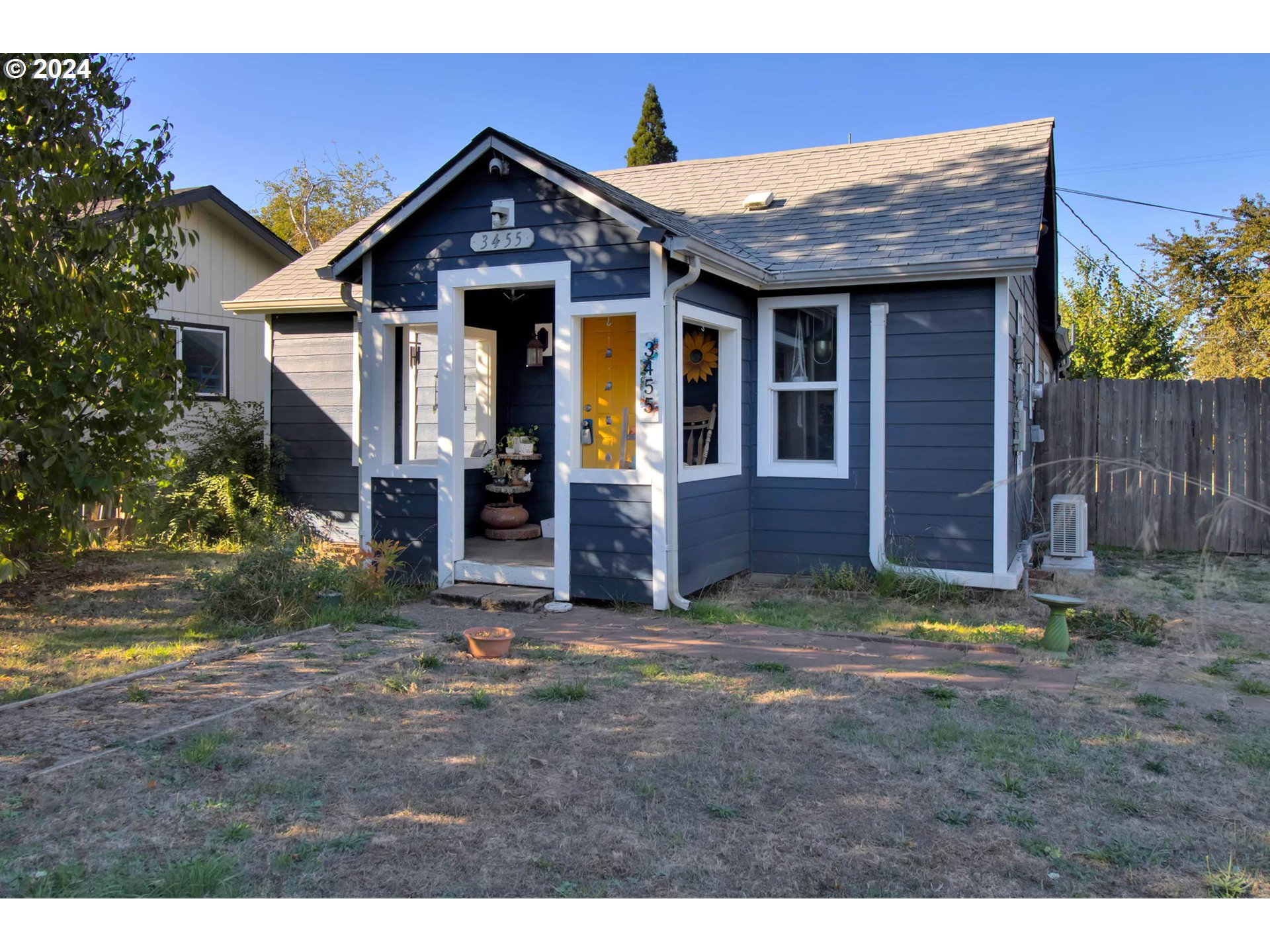 3455 Concord Street Eugene, OR 97402 - Photo 4 of 47 a front view of a house with a yard