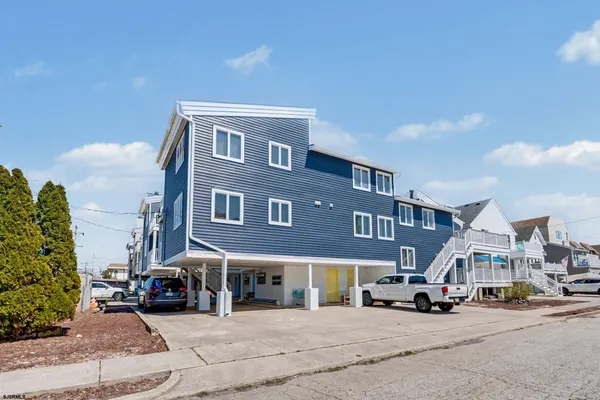 a front view of a building with street view