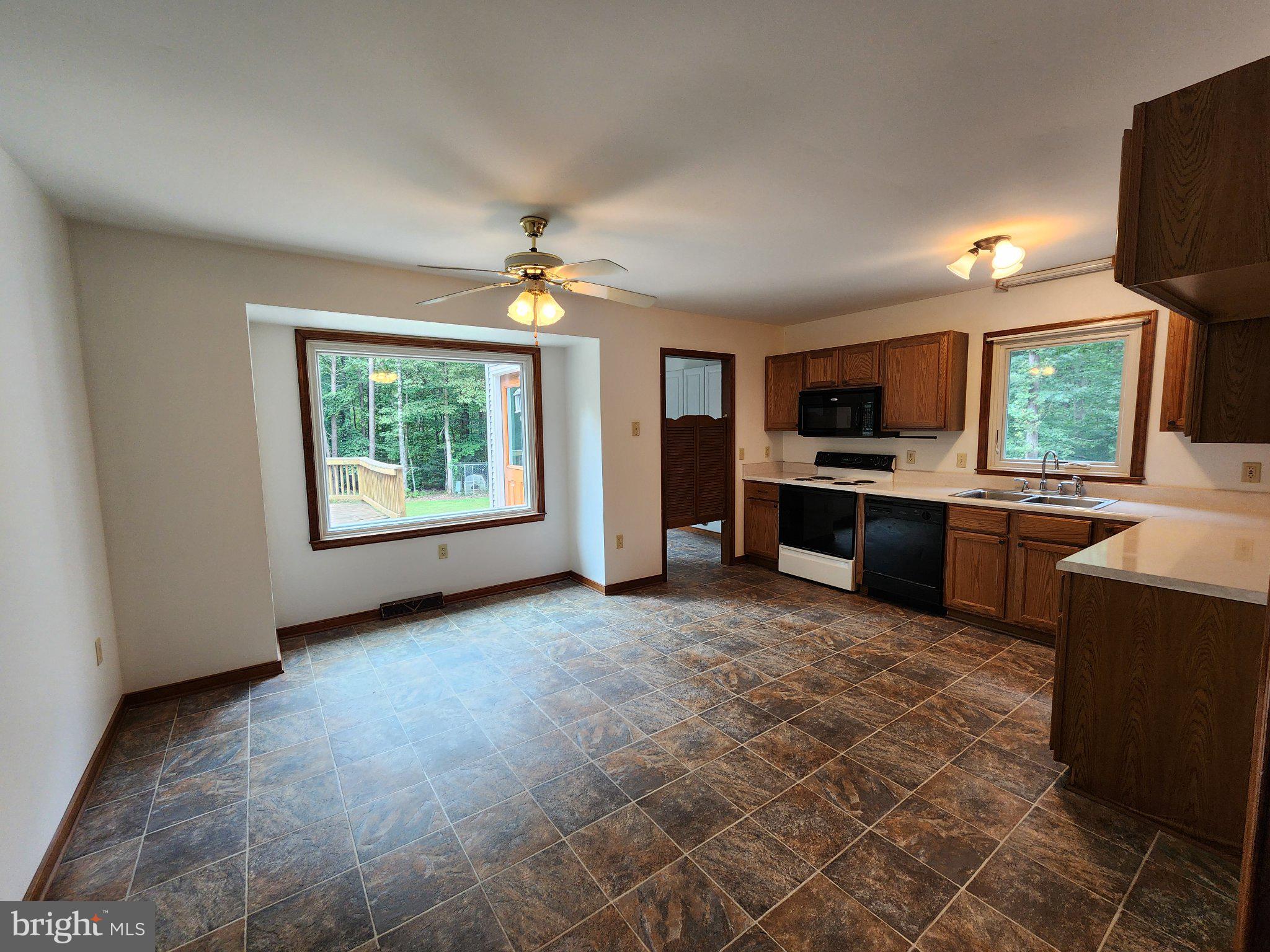 652 Jackson Road Bumpass, VA 23024 - Photo 7 of 18 Spacious kitchen with natural light.
