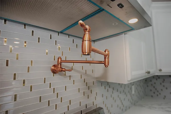 a kitchen that has a stove and a microwave