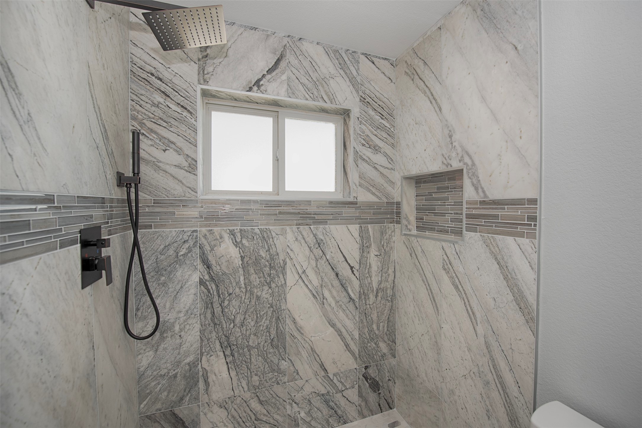 13235 Rampchester Lane Houston, TX 77015 - Photo 20 of 41 a view of a door and a window