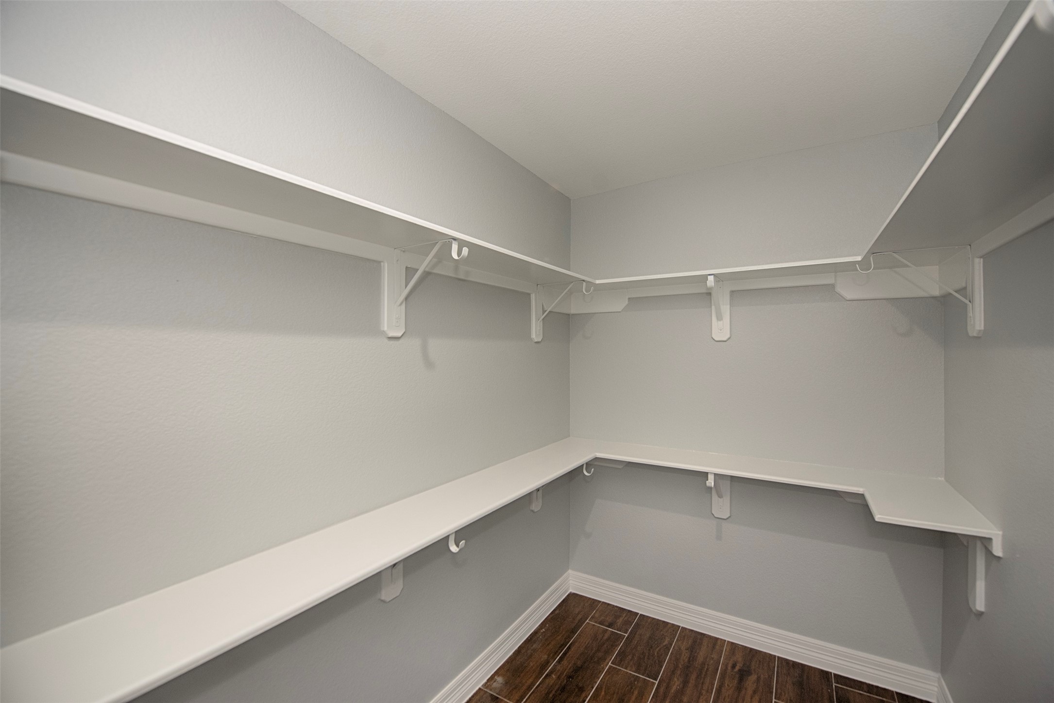 13235 Rampchester Lane Houston, TX 77015 - Photo 21 of 41 a view of an empty walk in closet
