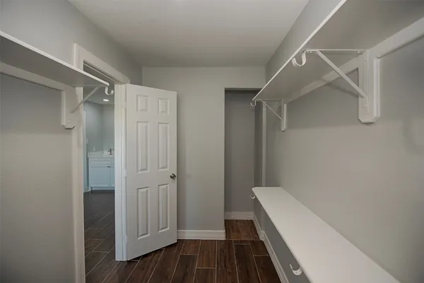 a bathroom with a sink and shower