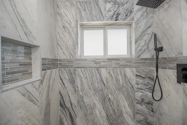 a view of a door and a window