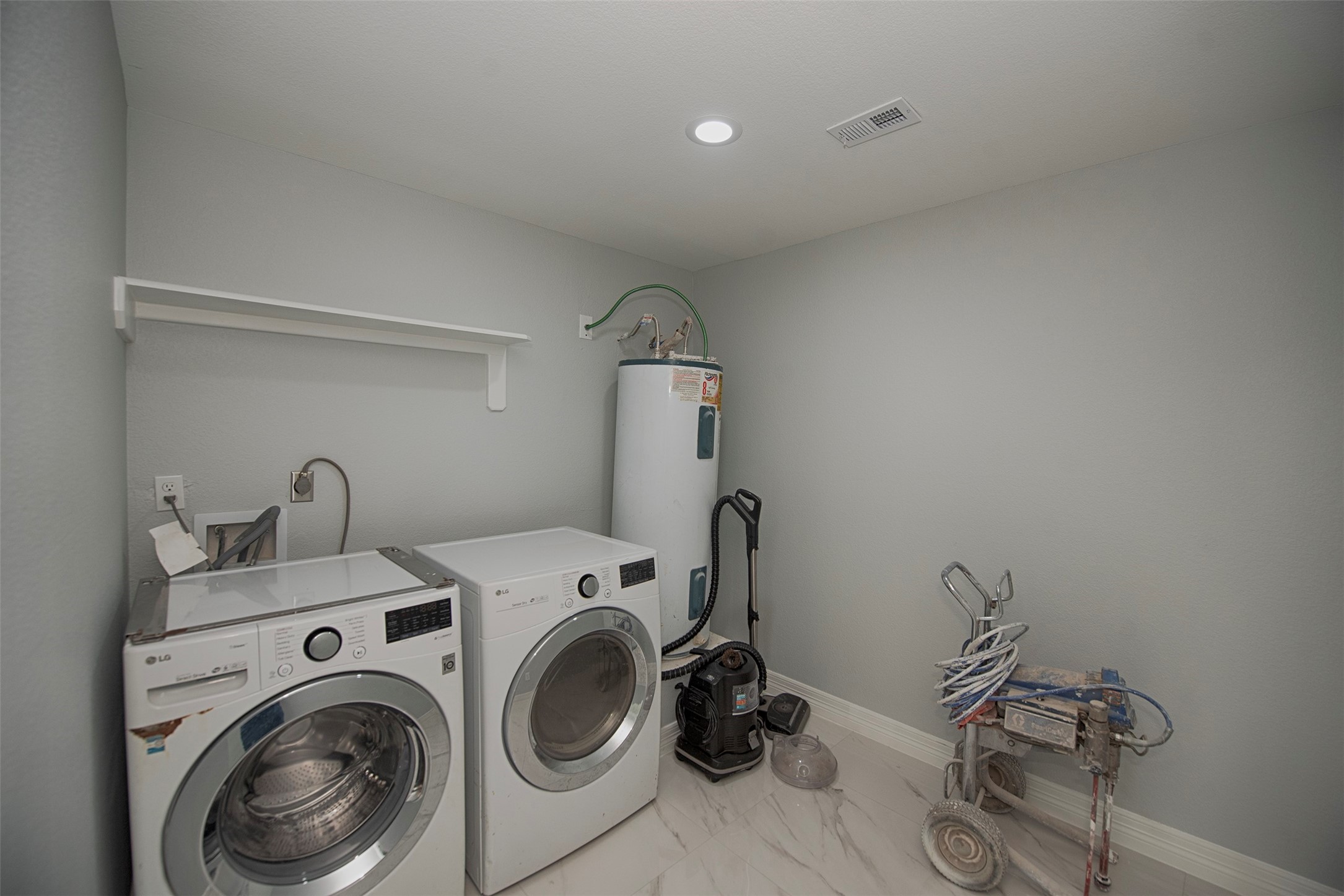 13235 Rampchester Lane Houston, TX 77015 - Photo 33 of 41 a utility room with dryer and washer