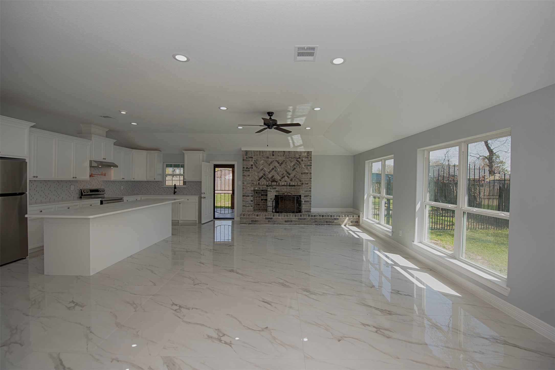 13235 Rampchester Lane Houston, TX 77015 - Photo 6 of 41 a living room with furniture and a fireplace