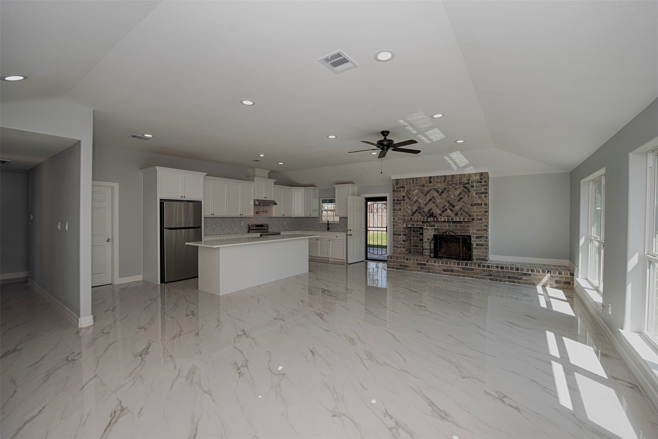 13235 Rampchester Lane Houston, TX 77015 - Photo 41 of 41 a view of kitchen with furniture and a fireplace