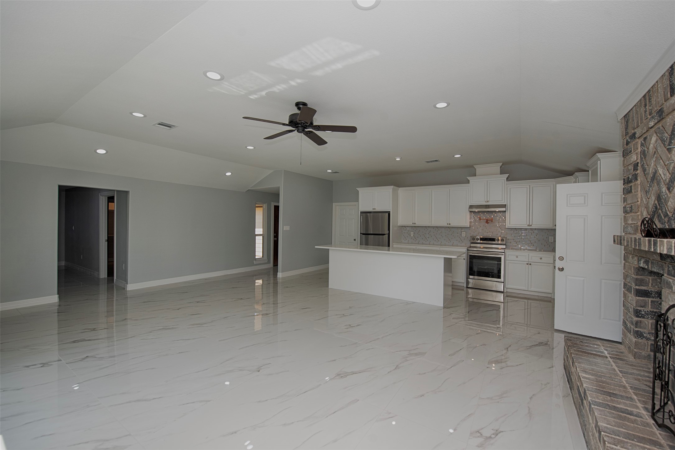 13235 Rampchester Lane Houston, TX 77015 - Photo 7 of 41 a view of kitchen with stainless steel appliances refrigerator oven and cabinets