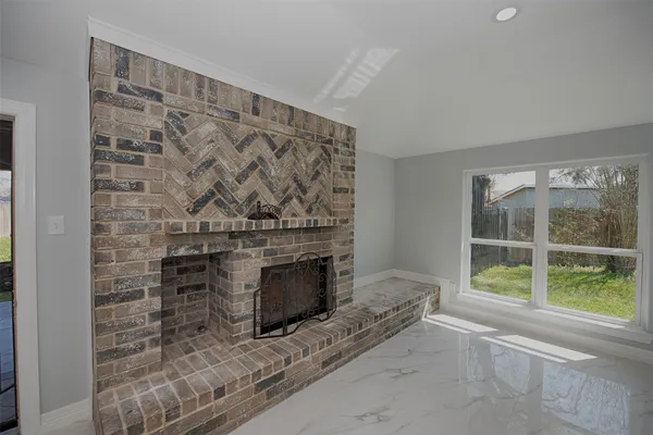 a view of kitchen with stainless steel appliances refrigerator oven and cabinets