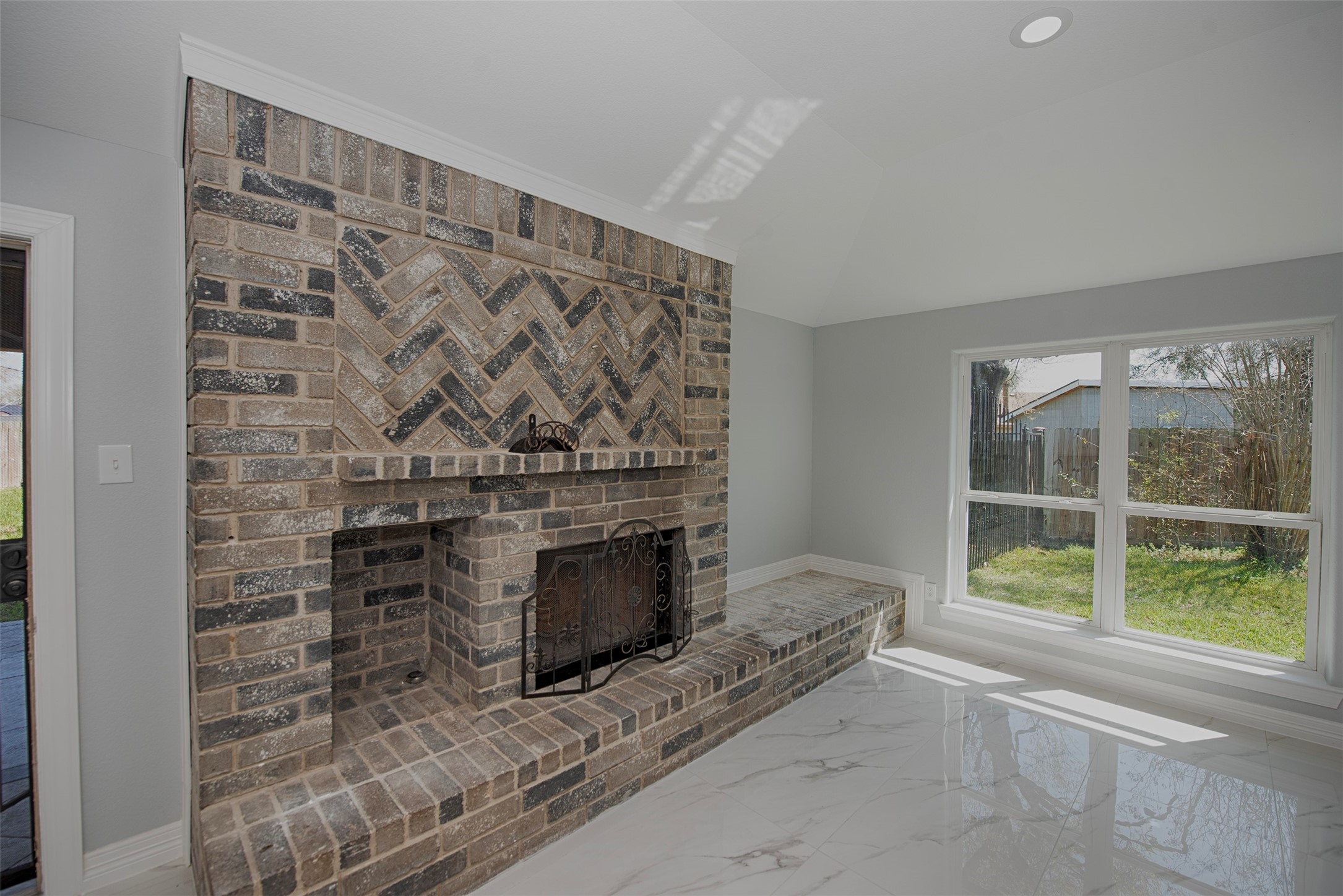 13235 Rampchester Lane Houston, TX 77015 - Photo 8 of 41 a living room with a fireplace