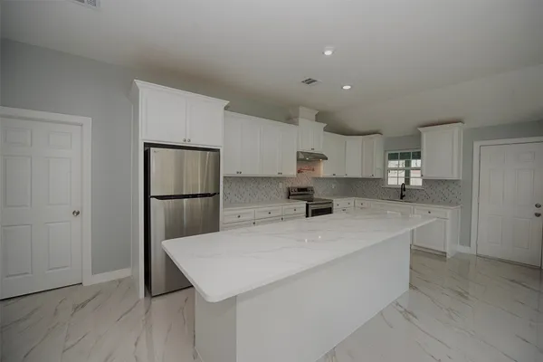 a living room with a fireplace