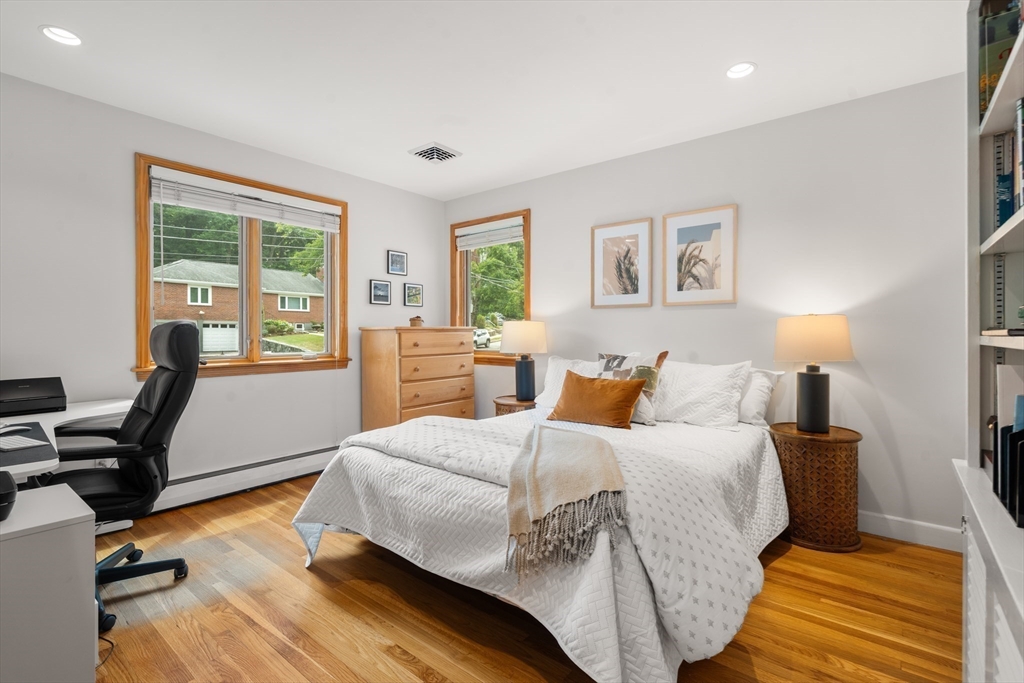 83 Bound Brook Road Newton, MA 02461 - Photo 15 of 21 a bedroom with a bed and a desk