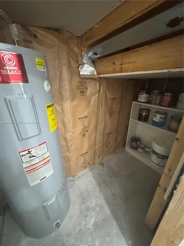 a kitchen with a refrigerator a microwave a sink and a stove