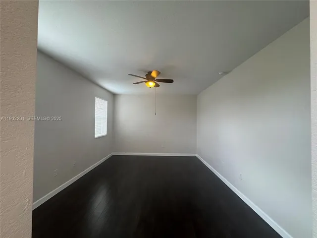 a view of a swimming pool with sitting area